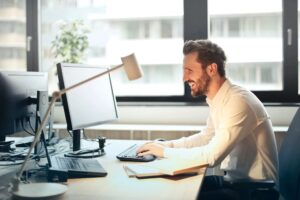 man updating his digital dealership software